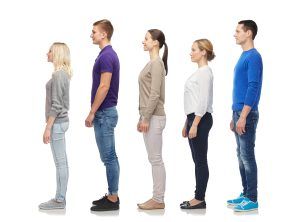 What can HGH do for Adults (Adults Lined up showing Height Difference)