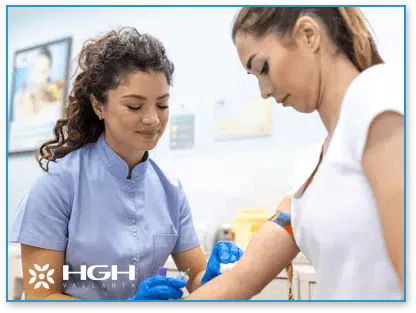 Nurse administering HGH to female patient