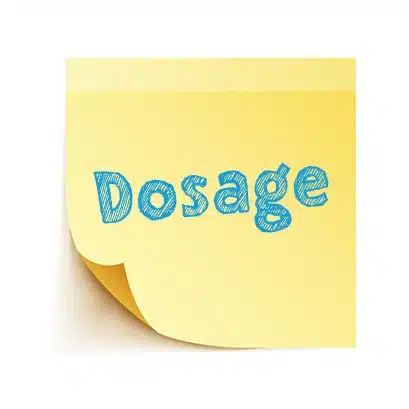 The word 'Dosage' written in blue letters on yellow sticky note