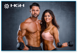 male and female bodybuilders holding a dumbell